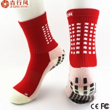 China the popular fashion styles of red gird mid calf anti slip soccer socks manufacturer
