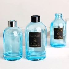 Cina Bottiglie rotonde con diffusore azzurro con etichette, tappi e collo a vite produttore