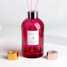 Cina Bottiglie rotonde con diffusore rosso con etichette, tappi e collo a vite produttore