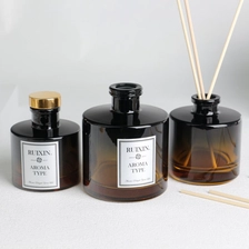 Cina Bottiglie con diffusore con collo a T sfumato da giallo a nero con etichette produttore