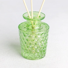 Cina bottiglia di diffusore trasparente a laser elettroplatato verde elettroplato produttore