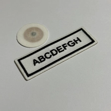 Chine Étiquette nfc tissée thermocollante pour vêtements NTAG213 Étiquette en tissu nfc lavable fabricant