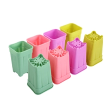 Chine 2,5 3 4 pouces blanc rose noir en plastique bon marché mini petit pot succulent mixte carré avec drainage fabricant