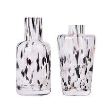 China Handmade colorful spot glass aromatherapy reed diffuser fragrance glass bottle wholesale manufacturer