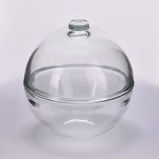 China Unique glass candle jar with ball shape wholesale manufacturer