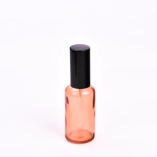 China 50ml 100ml transparent pink glass bottle with shiny black cap for supplier manufacturer
