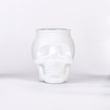 China Unique matte skull glass candle jar wholesale manufacturer