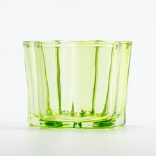 China 140ml transparent green color glass candle vessel home decor manufacturer