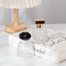 China 50ml Luxury frosted white Glass Perfume Bottle Wholesale manufacturer
