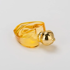 China Wholesale 50ml Love shape glass perfume bottle with gold cap manufacturer