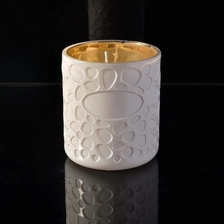 China Geo Cut Embossed White Glass Candle Jars For Candle Making manufacturer