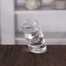 China 2 oz 60ML oblique bottom clear shot glasses customized  wholesale manufacturer
