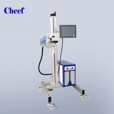 China food industrial effective flying CO2 laser marking machine printing for food plastic packing bags with one line manufacturer