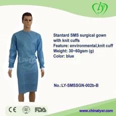 China Blue standard SMS surgical dress with knitted sleeve manufacturer