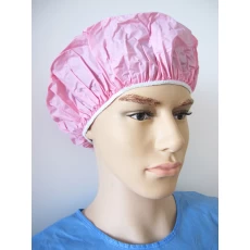 China Purely Pink PVC Single-Layer Disposable Bath Hat manufacturer