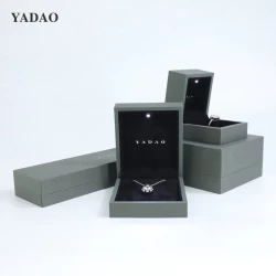 China High-end gray brown jewelry box with led light LED Lighted Jewelry Storage Custom logo color size manufacturer