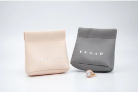 Protective features in packaging for delicate jewelry items