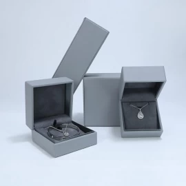 China Caixa de exibição de embalagem de joias em papel cinza personalizado com logotipo personalizado fabricante