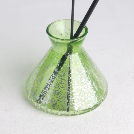China transparent green electroplated laser fleck finished flask shaped glass diffuser bottle manufacturer