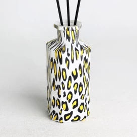China Water transfer finished leopard print pattern round glass diffuser bottle manufacturer
