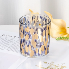 China Creative Pattern Decal Cylinder Glass Wax Jar for Poured Scented Candles Home Decor Display manufacturer