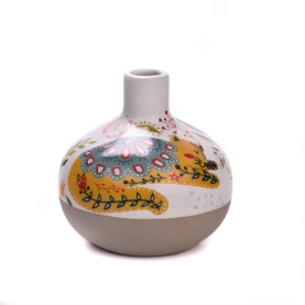 China Multi-color cat pattern ceramic aromatherapy bottles reed diffuser bottles manufacturer
