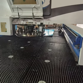 The CNC machines to pouch the holds on aluminum baking tools
