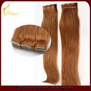 China Best selling products high quality 100% Brazilian virgin remy hair tape hair extension manufacturer