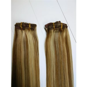 China Best selling two tone piano color brazilian human hair top a clip hair extension fabricante