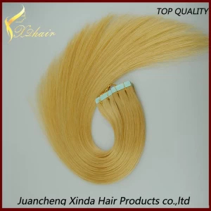 China Hoge kwaliteit 8 "-30" hoge kwaliteit wholesale 100% indian hair tape hair extensions krullend haar fabrikant