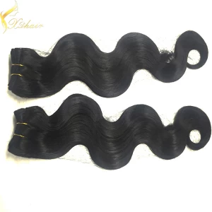 中国 High quality raw unprocessed grade 8a natural hair body wave peruvian hair メーカー