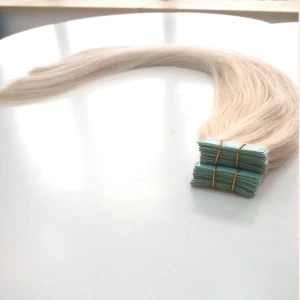China Hot selling with wholesale price , virgin human hair 18"cheap tape in hair extensions skin tape hair extension 40 pieces/pack fabricante