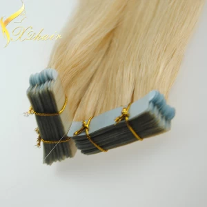 An tSín Top wholesale virgin Brazilian 100% human hair tape hair extensions curly 40 pieces déantóir