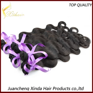 China Unprocessed 100% virgin hair Natural color Brazilian human hair extension Body wave hair weft body wave virgin brazilian hair extension manufacturer