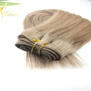 porcelana Wholesale 28 inch virgin remy natural black remy brazilian hair weft fabricante