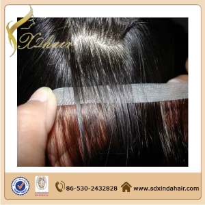 porcelana XINDA hot selling 100 human hair extension, tape in hair extentions fabricante