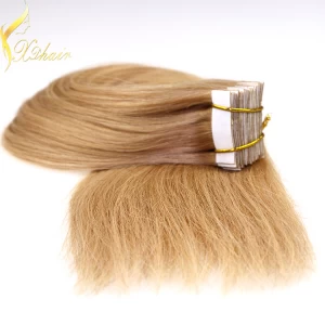 China wholesale top quality grade 7A unprocessed 8 - 30 inch remy tape hair extensions fabricante