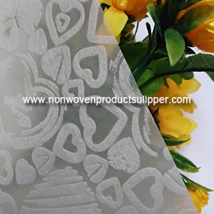 Light Yellow Heart-shaped Embossing GT-HSLIYE01 PP Spunbond Non Woven Custom Wrapping Paper On Sales
