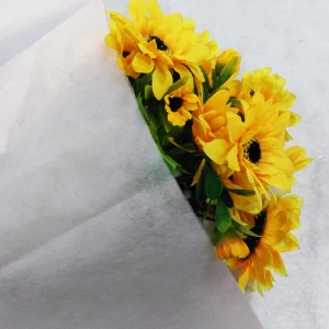 Embalaje de regalo de tejido no tejido de poliéster, envasado al por mayor de tela, empresa de decoración de flores sin tejer