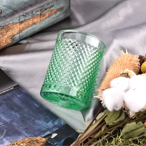 Wholesale premium color light green recessed grain glass candle jar