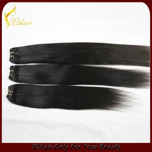 Cina Natural b;ack human hair weft top quality 100g per piece low price hair extension produttore
