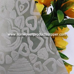 Luz - papel de envolvimento feito sob encomenda não tecido de gravação amarelo ondulado Heart-shaped de GT-HSLIYE01 PP em vendas
