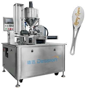 Precision controlled honey filling machine - turntable spoon design to eliminate waste