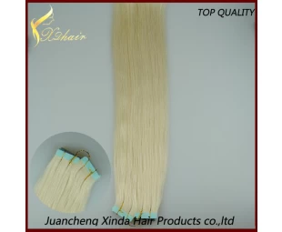La alta calidad del pelo 8 "-30" al por mayor 100% de las extensiones de cabello de cinta del pelo indio de la alta calidad y rizado
