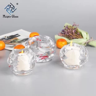 Fornitori di candelieri in vetro a forma di palla Cina, portacandele in cristallo trasparente all'ingrosso