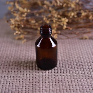 Wholesale different capacity small amber glass bottle