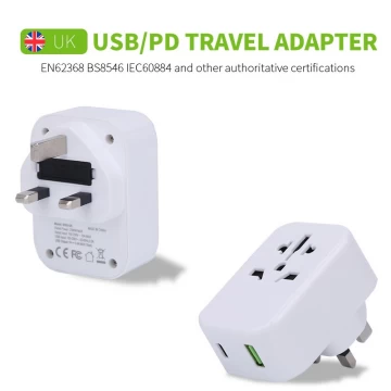 Adaptador de Enchufe Universal c/ Puerto USB Doble (EU/US/UK/AU