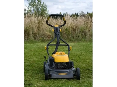 a walking lawn mower and a riding lawn mower,which one you like better?