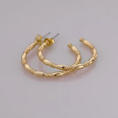 Gold Color Bamboo Shaped Half-C Brass Hoop Earring.
