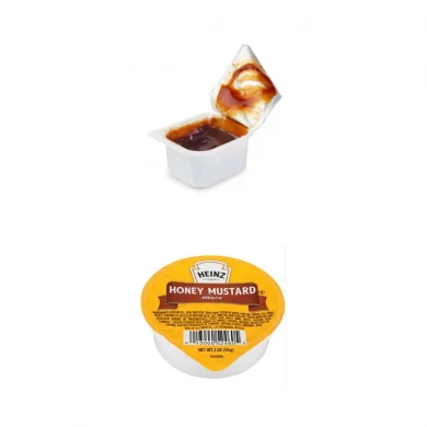 로타리 토마토 소스 충전 기계 - 막히지 않고 씨앗을 함유 한 소스를 부드럽게 채울 수 있습니다.